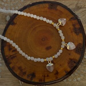 Elegant Gold and White Beaded Necklace